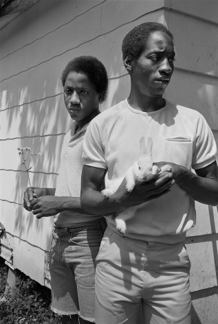 Young men with rabbit, Baton Rouge, Louisiana - 1983