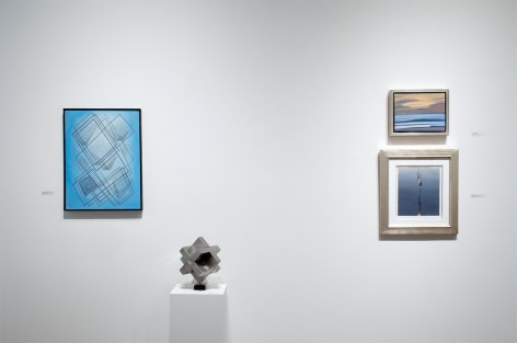 Installation photograph of JUXTAPOSED: The Art of Curation with works by Oskar Fischinger, Ken Bortolazzo, Hank Pitcher, and Joseph Goldyne