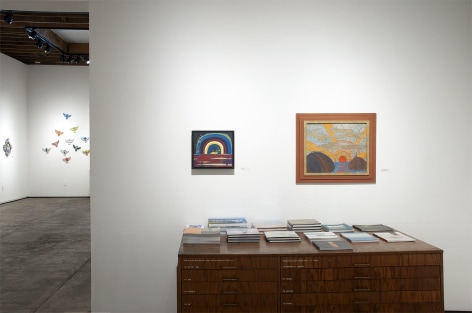 Installation photograph of The Winter Salon II, 2021 with works by Maria Rendon and Frederick Remahl with Inga Guzyte in the background