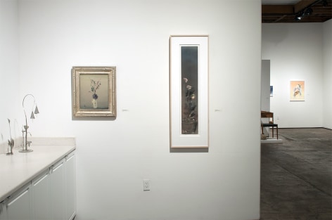 Installation photograph of The Winter Salon II, 2021 with works by Ken Bortolazzo, Leon Dabo and Joseph Goldyne with Nathan Huff exhibition in the background