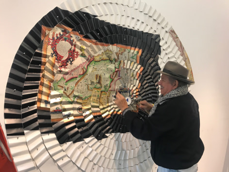 Miguel &Aacute;ngel R&iacute;os, installing Las estrellas nos gu&iacute;an at Sicardi | Ayers | Bacino 2019 Torn to Shreds [1992-93 Cibachrome mounted on pleated&nbsp;canvas and push pins, 112 9/16 x 91 5/16 in.]