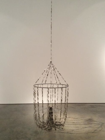Pedro Tyler, Deriva, 2014. Metal measuring tape and steel, Variable height x 37 in.