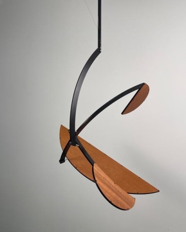 Pedro S. de Movell&aacute;n,&nbsp;SPHERICAL PLANE, 2023. Black anodized aluminum, mahogany veneer, stainless steel, brass, 42 in. [Maximum Swing] (106.7 cm.)