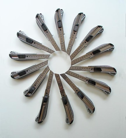 Pedro Tyler, Vertigo, 2010. Stainless steel rulers and metal cutters, 24 in. x 20 in.