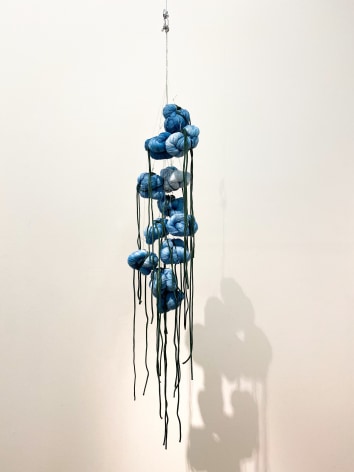 Sandra Monterroso, Puntos en resistencia azul. Edition. 2/13, 2019. Installation Indigo dyed yarn, loop, steel rope, 13 knots, 47 3/16 x 47 3/16 in.