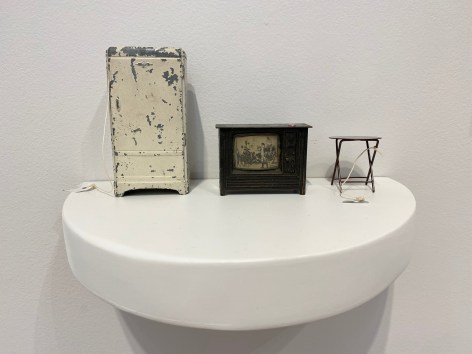 Liliana Porter, For Sale [Refrigerator, TV, Table], 2018. Objects on white shelf, 7 x 10 1/2 x 6 1/2 in. (17.8 x 26.7 x 16.5 cm.)