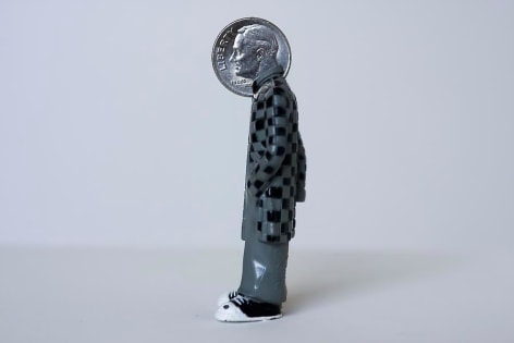 Nicol&aacute;s Paris, Subject, 2009, Plastic figure and dime, 6.8 cm x 2.8 cm x 2.5 cm, Courtesy of Galer&iacute;a Luisa Strina