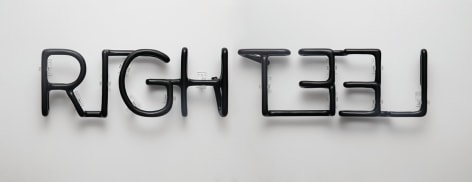 Gabriel de la Mora, RIGHT - LEFT, 2017. Hand-carved Obsidian, 5 11/16 x 32 5/8 x 2 1/8 in. (14.5 x 83 x 5.5 cm.)