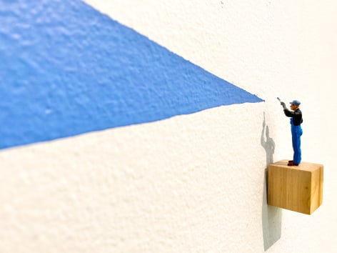 Liliana Porter, Man Painting [Hombre pintando], 2018. Wall installation with acrylic, figurine, and wooden base