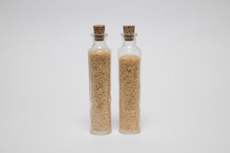 Gabriel de la Mora, 150 vs. 160 gr, 2002. Alphabet soup [pasta] and glass bottles, 6 7/8 x 1 3/8 x 1 3/8 in. (17.5 x 3.5 x 3.5 cm.) each