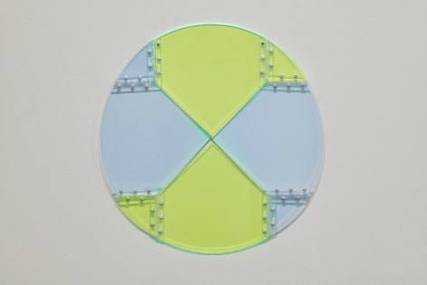 Marta Chilindron. Convertible Circle, 2014, fluorescent green and blue acrylic and hinges, 30 in. diameter.