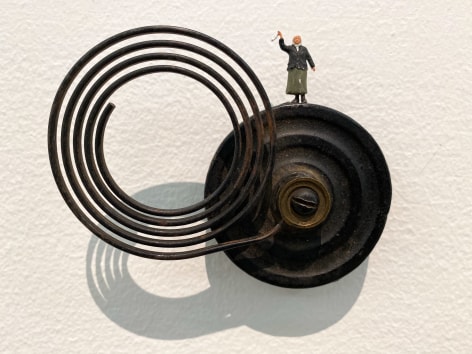 Liliana Porter, The Sign, 2018. Wall installation with metal and painted figurine, 3 x 4 1/2 x 1 1/2 in. (7.6 x 11.4 x 3.8 cm.)