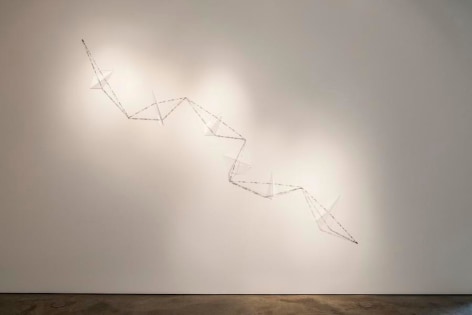 Pedro Tyler, Raz&oacute;n suficiente, 2015. Metal measuring tape and acrylic, Variable dimensions.