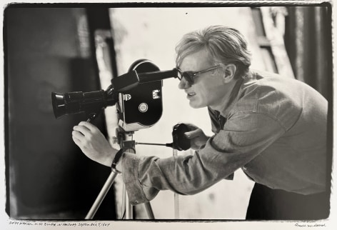 Fred McDarrah, Andy Warhol with Bolex in Factory, September 5, 1964.