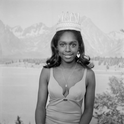 Raphael Albert Beauty queen posing against alpine backdrop, London, 1970s