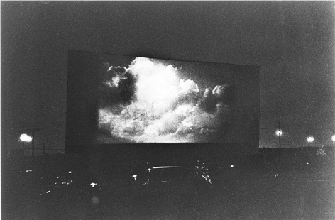 Diane Arbus Clouds on screen at a drive-in, N.J.