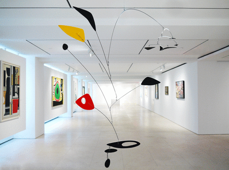 Installation view of Selected Works by 20th Century Masters featuring Alexander Calder's Hanging Mobile, Untitled, 1948, sheet metal, wire and paint, 134.6 x 182. 8 x 63.5 cm. (53 x 72 x 25 in.) Photography by Bianca Boragi. &copy;Helly Nahmad Gallery NY.