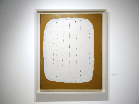 Installation view of Selected Works by 20th Century Masters featuring Lucio Fontana, Concetto Spaziale, 1960, Oil on canvas, 100 x 81 cm. (39 ⅜ x 31 ⅞ in.)  Photography by Bianca Boragi. &copy;Helly Nahmad Gallery NY.