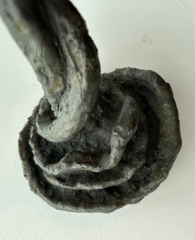 Close up image of base of bronze sculpture titled Snake &amp; Bird on Branch #2 by Yulla Lipchitz.