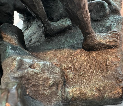 Close-up image of signature on bronze sculpture titled Woman Dancing About Trees by Yulla Lipchitz.