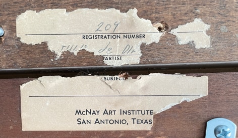 Image of label verso fragment from McNay Art Institute on &quot;The Magician&quot; painting by Julio De Diego.