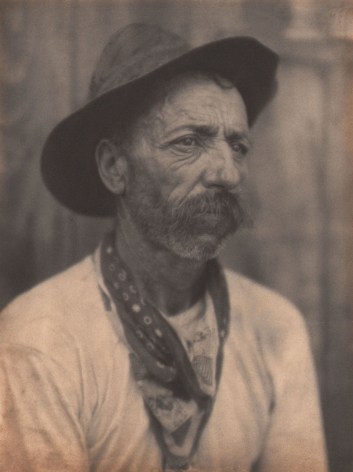 Doris Ulmann, Untitled (Miner), ​1928&ndash;1934. Portrait of a man wearing a hat and handkerchief looking off to the right of the frame.