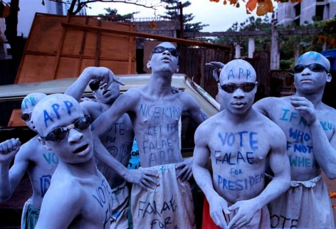 01. Campaign Workers for Falae: Nigerian boys in makeup with the African Peoples Party (AFP) letters painted on their skin. The APP challenger Olu Falae lost the election of the presidency of Nigeria to Olusegon Obasanjo, 1999.
