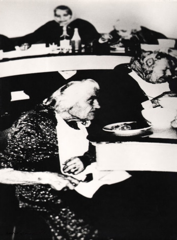 04. Mario Giacomelli, Verr&agrave; la morte e avr&agrave; i tuoi occhi, 1966&ndash;1968. High contrast image. Seated old women eating a meal (two in foreground, two in background).