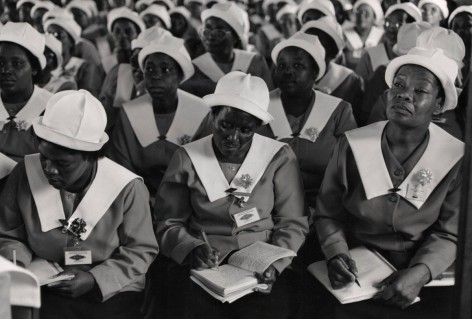 Women&rsquo;s Auxiliary Listening to Mandela: A lady&#039;s&nbsp;auxiliary listens attentively and takes notes as Nelson Mandela gives a campaign speech at this church in Pretoria, South Africa.
