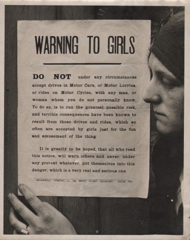 1. General Picture News, Churches Warning to Girls, c. 1920. A woman in profile on the right of the frame with one hand on a pasted sign that begins: &quot;Warning to girls: Do not under any circumstances accept drives in Motor Cars, or Motor Lorries, or rides on Motor Cycles, with any man, or woman whom you do not personally know...&quot;