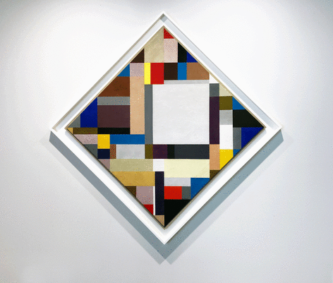 An abstract painting in the shape of a diamond and framed in a white frame