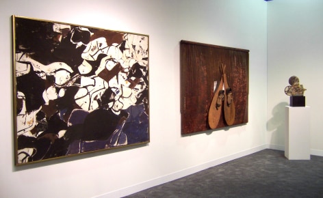(From Left) Conrad Marca-Relli, &quot;Ornations,&quot; 1957, oil and canvas collage, 53 x 66 1/2 in., Salvatore Scarpitta, &quot;Chain Mail Pizzeria,&quot; 1991, mixed media, 54 x 75 1/2 in., Christo and Jeanne-Claude, &quot;Wrapped Movie Projector,&quot; 1966, movie projector, plastic, rope, twine with metal container, 21 1/2 x 7 1/2 x 15 in.