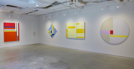 Four paintings installed on a white wall at the Washburn Gallery