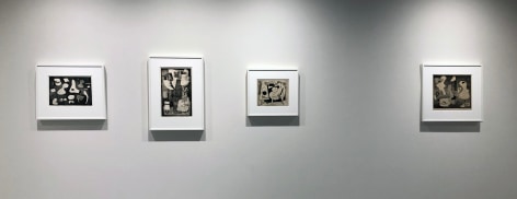 Four black and white prints by Alice Trumbull Mason hanging on a white wall