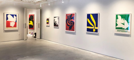 Installation view of six posters by Jack Youngerman.