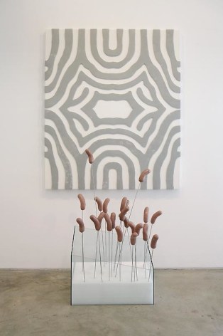 Michael Joo. Axis (Africanized Wurst), 2008.&nbsp;Hand-built plastic on canvas with cast epoxy and enamel paint, ethafoam, stainless steel, 232 x 124 x 67 cm.&nbsp;Courtesy of the artist &amp;amp; PKM Gallery.
