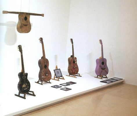 Bae Young-whan. The Way of Man-Array, 2005. Guitars buil with abandoned wood, Size variable. Installation view of solo exhibition &quot;Song for Nobody,&quot; at PLATEAU, 2012.
