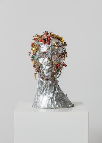 Lee Bul. Mask for a Warrior Princess, 1996. Sequins, beads, wires, feathers, chrome paint, mannequin head, 40 x 25 x 25 cm. Courtesy of the artist &amp;amp; PKM Gallery.