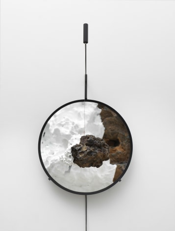 Olafur Eliasson, Day and night lava (Ed. 2/12 + 2 AP), 2018. Concave mirror, stainless steel, lava stone, LED, motor, paint, (black, white), wire, 84.5 x 67 x 62 cm. Courtesy of the artist &amp;amp; PKM Gallery.