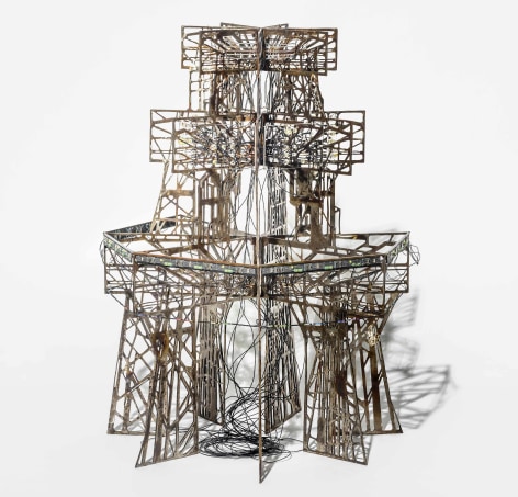 Lee Bul. Study for Aubade V (1/5 Scale), 2019, Casted steel (collected from demolished check point in DMZ), glass beads, printed circuit board, electronic components, black board, brass angle, Optium museum acrylic, light bulb, paints for stained glass, coated steel wire, nickel wire, electric wire, high solid gel, 80cm high x 50 cm in diameter, Variation 1 of 3, 1 AP. Courtesy of the artist &amp;amp; PKM Gallery.