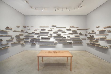 Bae Young-whan. Autonumina, 2010. Installation of celadon objects&nbsp;on wooden shelves, variable dimensions, 151.3 x 26.7 x 21 cm.