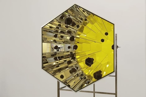 Olafur Eliasson. Lava kaleidoscope, 2012.&nbsp;Aluminium, stainless steel, mirror, colored glass(yellow), lava rock, 211 x 88.5 x 220 cm. Courtesy of the&nbsp;artist &amp;amp; PKM Trinity Gallery. &copy; 2012 Olafur Eliasson.
