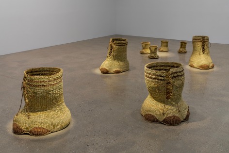 Young In Hong,&nbsp;𝘛𝘩𝘪 𝘢𝘯𝘥 𝘈𝘯𝘫𝘢𝘯,&nbsp;2021,&nbsp;Sound Installation and 2 pairs of straw woven shoes for elephants: 48 x 71 x 60 cm Shoes for hind feet (large, 2 pcs), 60 x 62 x 60 cm Shoes for front feet (large, 2 pcs), 22 x 30 x 28 cm Shoes for hind feet (small, 2 pcs), 23 x 27 x 28 Shoes for front feet (small, 2 pcs), Sound duration: 14 mins 8 secs. Courtesy of Young In Hong &amp;amp; PKM Gallery.