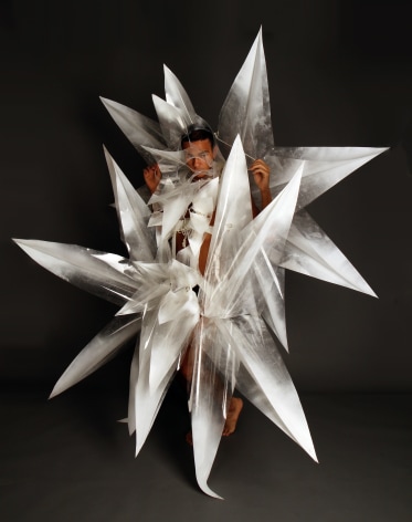 ARMANDO LOPEZ-BIRCANN Refraction 2 2012, performance in plastic performative sculpture