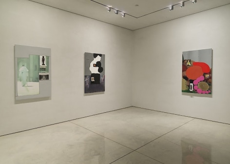 A photograph of three mixed media works installed at Mary Boone Gallery.