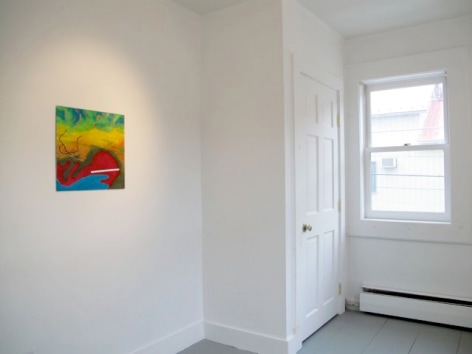 A photograph of an artwork at the left, with a doorway and window at right