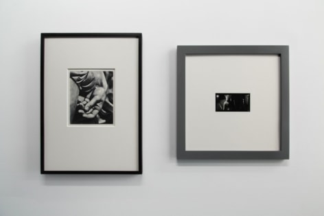 A photograph of 2 black and white photographs, framed.