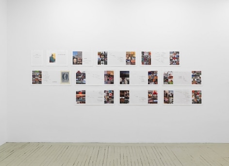 An assembly of 9 double-page spreads, 2 single-page spreads, and one cover page. Each is installed on a white wall in the gallery, in 3 rows.