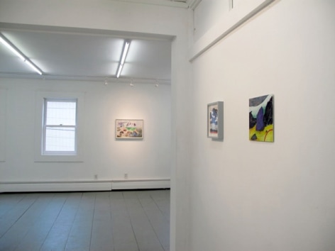 A photograph of 3 paintings: 2 on a wall at right, and one in the background