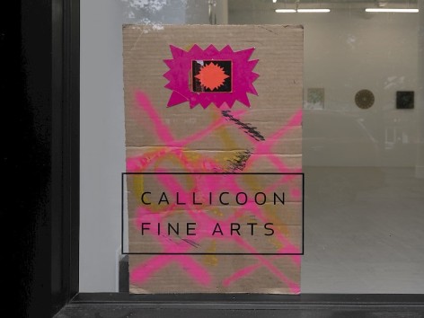 A piece of cardboard painted with pink X's, that also has a small fuchsia starburst at the top of the piece. It is placed the &quot;Callicoon Fine Arts&quot; logo in the gallery's front window.